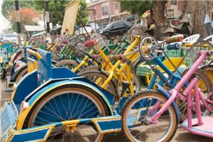 A workshop run by Mr Ahmad employs young polio survivors. The workshop produces hand-crank cycles, like these, which give those paralysed by polio much greater mobility. Christine McNab