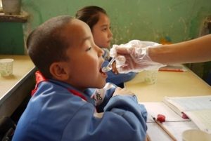 A school pupil is vaccinated against polio WHO/ C.Wolf